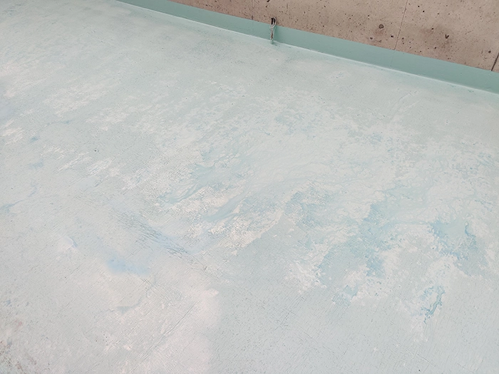 Example showing possible outcome when waterproofing membrane is applied during wet weather